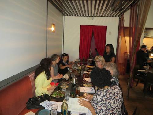 Corporate Concierge members enjoy a delicious Mediterrean meal at Souk